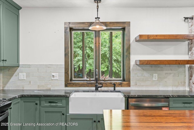 11100 S Bird Rd, Dowling, MI 49050 - kitchen with green cabinetry, dishwasher, open shelves, and backsplash