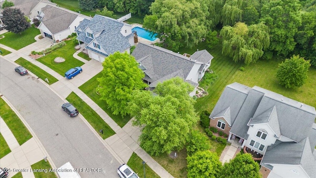 2308 Keller Rd, Holt, MI 48842 - aerial view of residential area featuring a pool