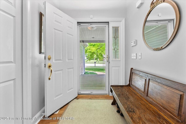2308 Keller Rd, Holt, MI 48842 - foyer featuring wood finished floors and baseboards