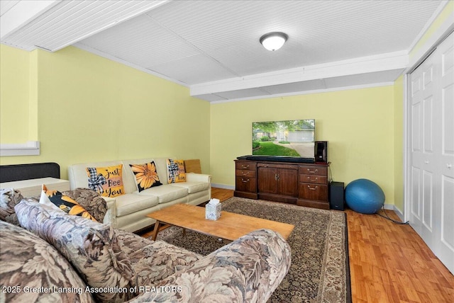 2308 Keller Rd, Holt, MI 48842 - living area featuring wood finished floors and crown molding