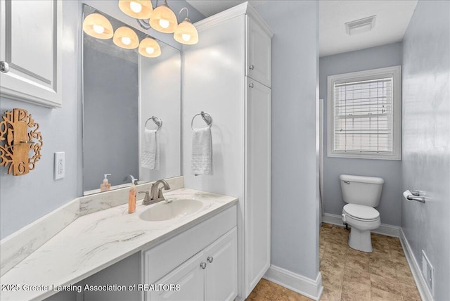 2308 Keller Rd, Holt, MI 48842 - full bathroom with vanity and toilet