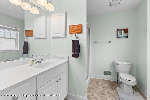 2308 Keller Rd, Holt, MI 48842 - bathroom with vanity and a shower