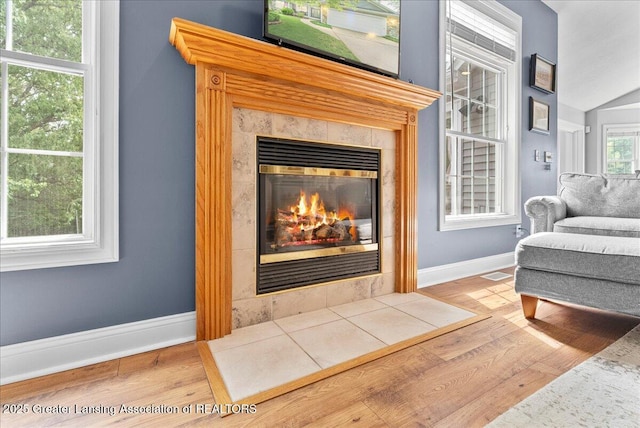 2308 Keller Rd, Holt, MI 48842 - detailed view of wood finished floors and a fireplace