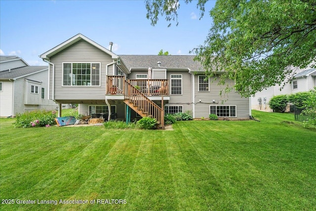 2308 Keller Rd, Holt, MI 48842 - rear view of house with stairs, a deck, and a lawn