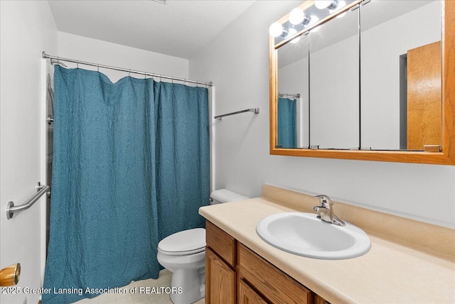 235 Bonnie Brook Dr Unit 1, Charlotte, MI 48813 - full bath with vanity, tile patterned floors, and a shower with curtain