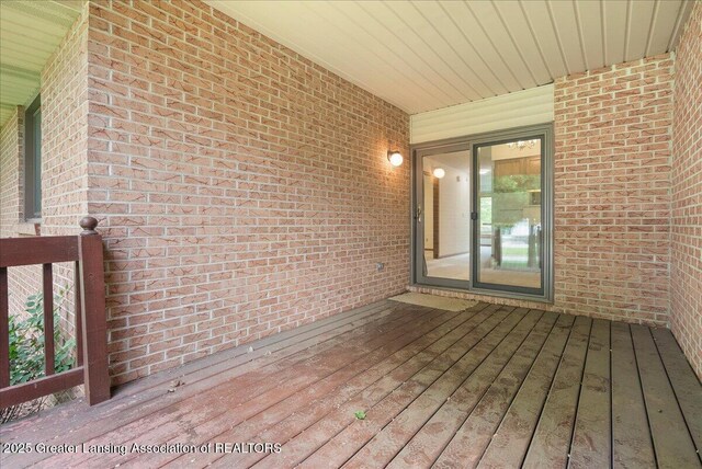 235 Bonnie Brook Dr Unit 1, Charlotte, MI 48813 - view of deck