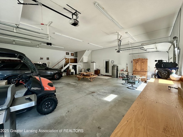 10497 Charlotte Hwy, Portland, MI 48875 - garage with a garage door opener