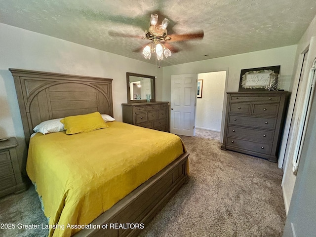 10497 Charlotte Hwy, Portland, MI 48875 - bedroom featuring carpet floors, a textured ceiling, and a ceiling fan