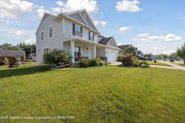 8687 Yellowstone Ln, Lansing, MI 48917 - view of front of property with a garage, covered porch, and a front lawn