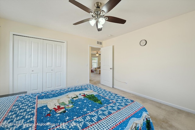 8687 Yellowstone Ln, Lansing, MI 48917 - bedroom featuring light carpet, a closet, and ceiling fan