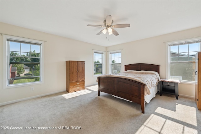 8687 Yellowstone Ln, Lansing, MI 48917 - bedroom featuring carpet and ceiling fan