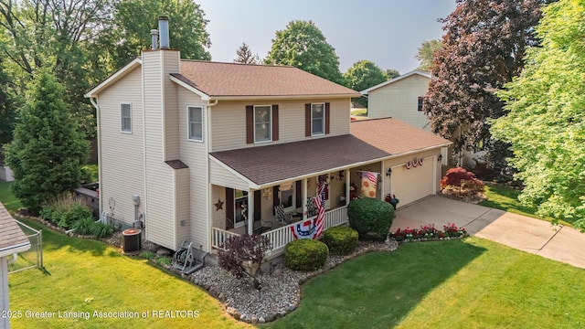 533 Middlebury Ln, Mason, MI 48854 - view of front facade with a porch, a shingled roof, driveway, a front yard, and an attached garage