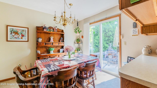533 Middlebury Ln, Mason, MI 48854 - dining space featuring a chandelier