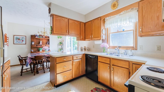 533 Middlebury Ln, Mason, MI 48854 - kitchen with dishwasher, a peninsula, white electric range oven, and light countertops