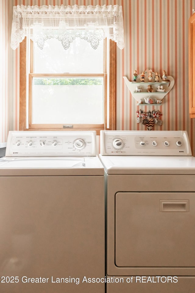 533 Middlebury Ln, Mason, MI 48854 - laundry room with wallpapered walls and washing machine and clothes dryer