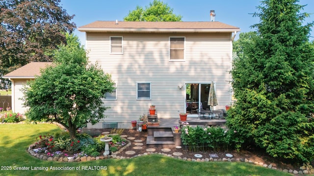 533 Middlebury Ln, Mason, MI 48854 - back of property with a lawn