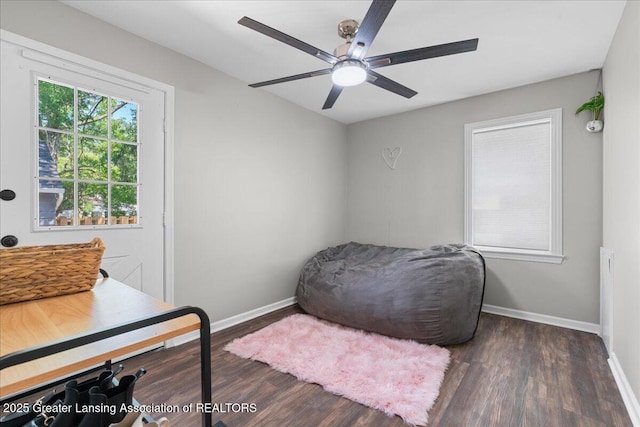 952 Sunset Ln, East Lansing, MI 48823 - bedroom featuring wood finished floors and a ceiling fan