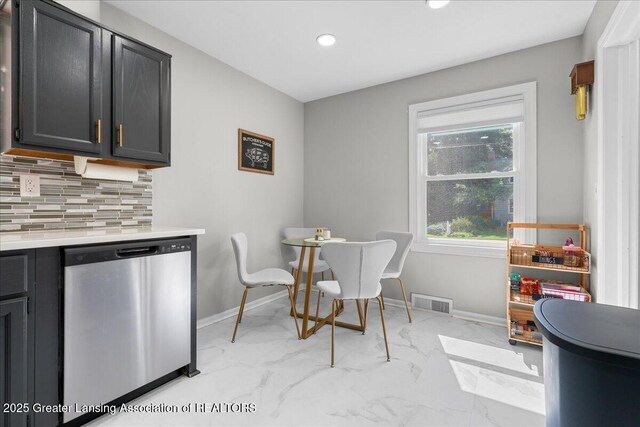 952 Sunset Ln, East Lansing, MI 48823 - dining room with light marble finish flooring and recessed lighting
