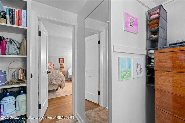 952 Sunset Ln, East Lansing, MI 48823 - hall featuring wood finished floors