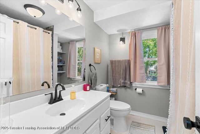 952 Sunset Ln, East Lansing, MI 48823 - bathroom featuring vanity and tile patterned flooring