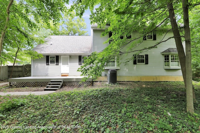 1204 Burlington Dr, Grand Ledge, MI 48837 - back of property featuring a wooden deck and roof with shingles