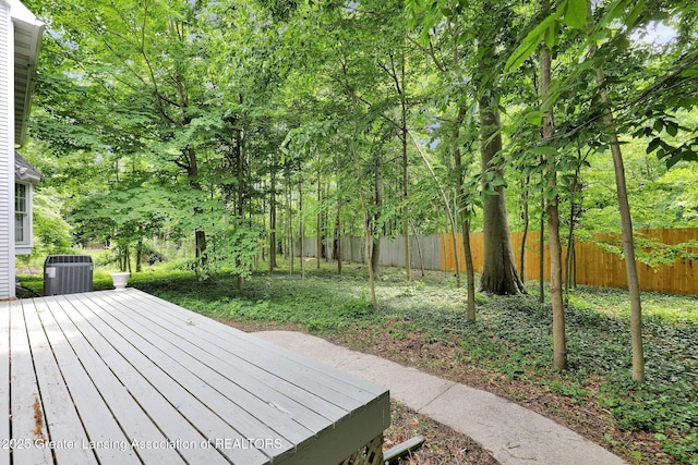 1204 Burlington Dr, Grand Ledge, MI 48837 - wooden terrace featuring a fenced backyard