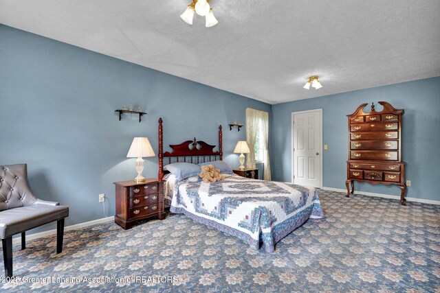 1204 Burlington Dr, Grand Ledge, MI 48837 - bedroom featuring carpet floors and a textured ceiling