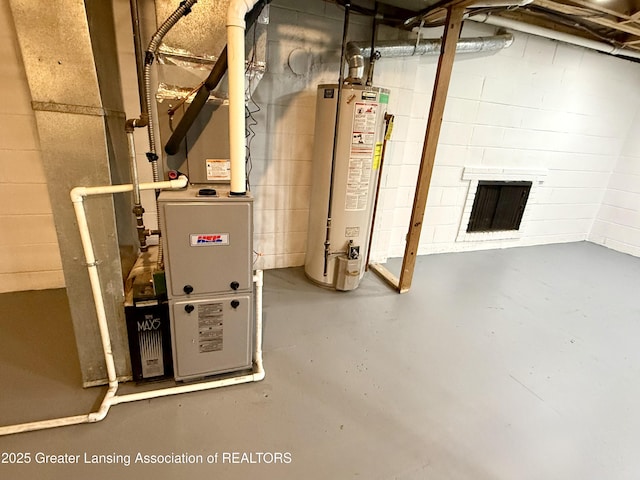 3321 Springbrook Ln, Lansing, MI 48917 - utility room featuring water heater