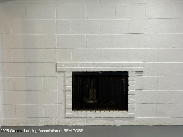 3321 Springbrook Ln, Lansing, MI 48917 - detailed view of a brick fireplace