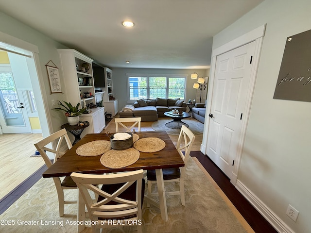 3321 Springbrook Ln, Lansing, MI 48917 - dining room featuring wood finished floors and recessed lighting
