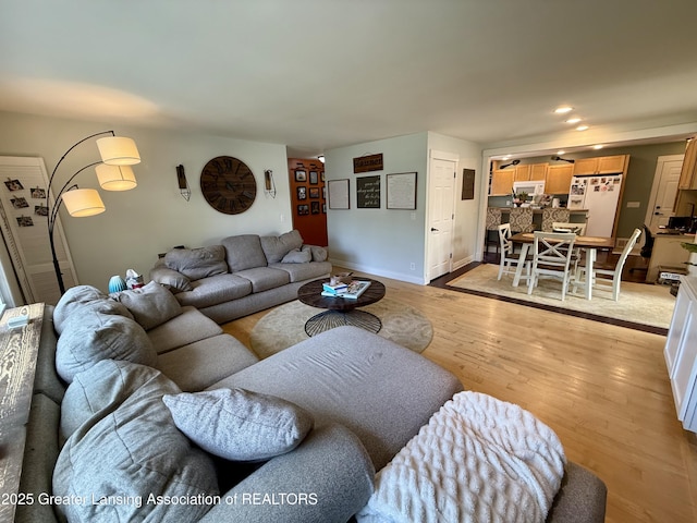 3321 Springbrook Ln, Lansing, MI 48917 - living room with light wood-style flooring and recessed lighting