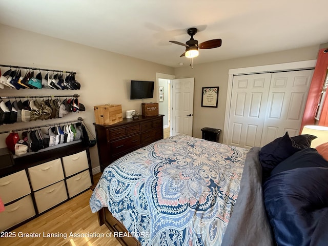 3321 Springbrook Ln, Lansing, MI 48917 - bedroom with light wood finished floors, a closet, and ceiling fan