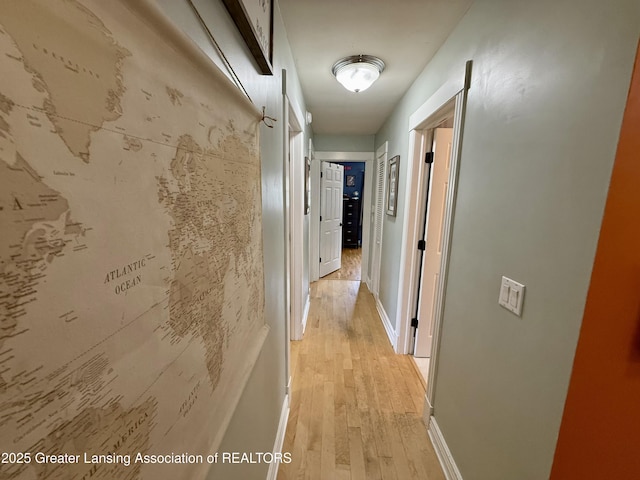 3321 Springbrook Ln, Lansing, MI 48917 - corridor featuring light wood-style floors