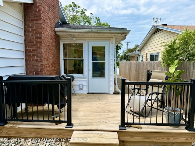 3321 Springbrook Ln, Lansing, MI 48917 - wooden deck with grilling area