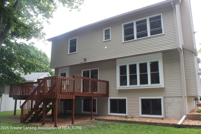 8522 Ember Glen Pass, Lansing, MI 48917 - back of property with a wooden deck and stairway