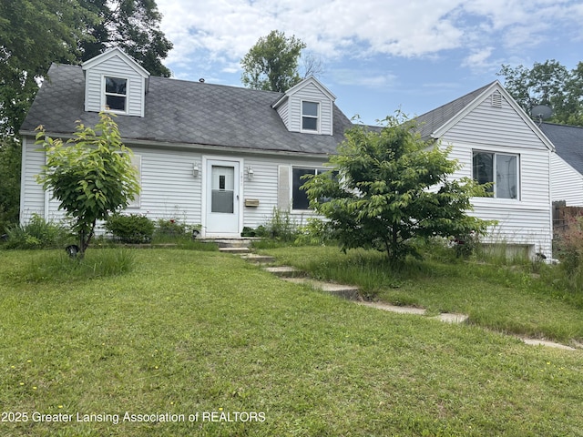 1311 W Saginaw St, East Lansing, MI 48823 - cape cod house with a front lawn