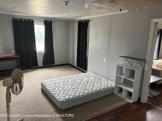 1311 W Saginaw St, East Lansing, MI 48823 - bedroom featuring wood finished floors and crown molding