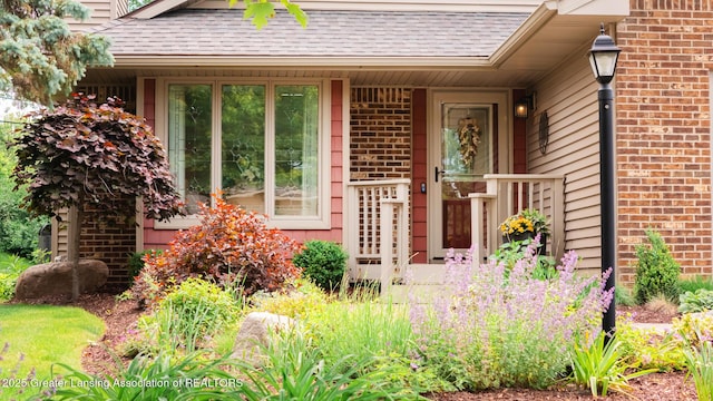 3522 Apple Valley Rd, Okemos, MI 48864 - entrance to property featuring brick siding and a shingled roof