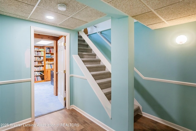 3522 Apple Valley Rd, Okemos, MI 48864 - stairway featuring a drop ceiling, wood finished floors, and recessed lighting