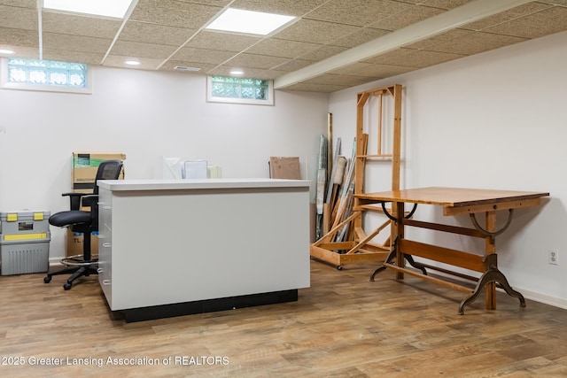 3522 Apple Valley Rd, Okemos, MI 48864 - office area featuring wood finished floors, healthy amount of natural light, and a paneled ceiling