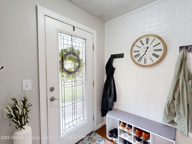 6916 Toboggan Ln, Lansing, MI 48917 - entryway featuring wood finished floors