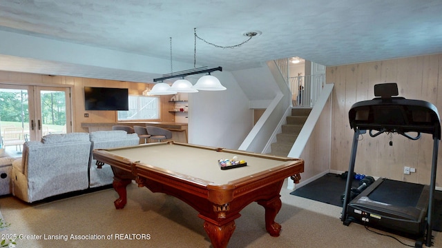 6916 Toboggan Ln, Lansing, MI 48917 - rec room with wood walls, healthy amount of natural light, french doors, billiards, and a textured ceiling