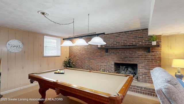 6916 Toboggan Ln, Lansing, MI 48917 - playroom featuring a fireplace, pool table, wooden walls, and carpet