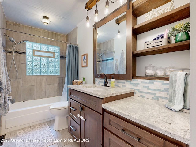 6916 Toboggan Ln, Lansing, MI 48917 - full bath with vanity, shower / bath combination with curtain, and backsplash