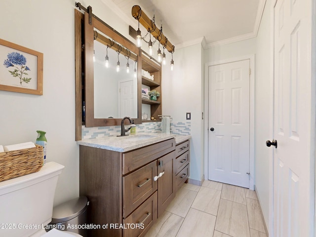 6916 Toboggan Ln, Lansing, MI 48917 - bathroom with decorative backsplash, vanity, ornamental molding, and marble finish flooring