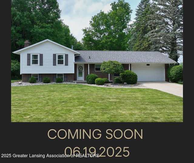 6916 Toboggan Ln, Lansing, MI 48917 - split level home with a garage, a front lawn, driveway, and brick siding