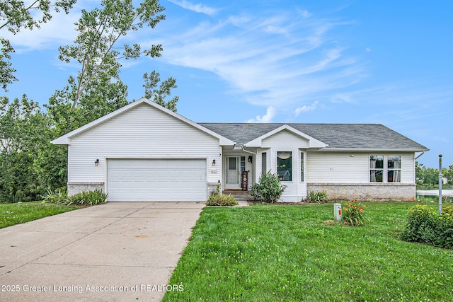 6093 Anchor Cv, Dimondale, MI 48821 - ranch-style home with brick siding, driveway, a garage, and a front yard