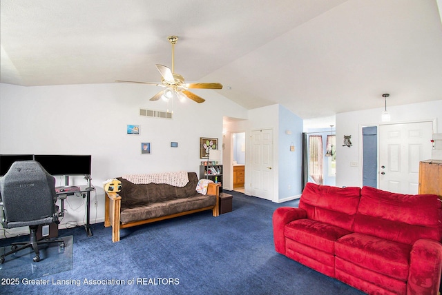 6093 Anchor Cv, Dimondale, MI 48821 - carpeted living room featuring a ceiling fan, a desk, and high vaulted ceiling