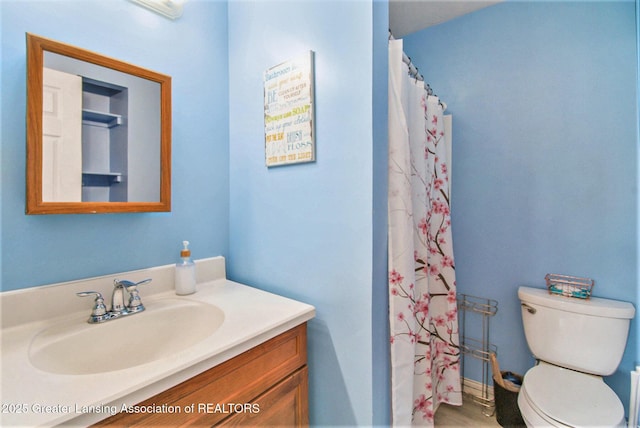 6093 Anchor Cv, Dimondale, MI 48821 - bathroom featuring vanity and a shower with shower curtain