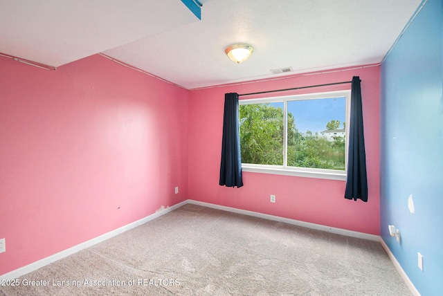 6093 Anchor Cv, Dimondale, MI 48821 - carpeted spare room featuring baseboards